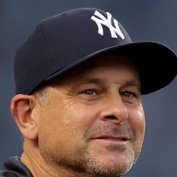 New York Yankees manager Aaron Boone (17) reacts after defeating the Tampa Bay Rays at Yankee Stadium on July 31. 