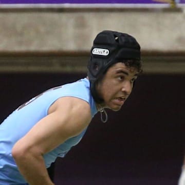 Arena Elite 15U’s Kasen Thomas (9), left, runs a route during a 7-on-7 football tournament Saturday, April 13, 2024 at the UNI Dome in Cedar Falls, Iowa.