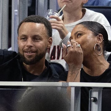 Aug 9, 2025; San Francisco, California, USA; Golden State Warriors star Stephen Curry and his wife Ayesha take in a Golden State Valkyries game against the Los Angeles Sparks at Chase Center. Mandatory Credit: D. Ross Cameron-Imagn Images