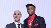 Jun 25, 2025; Brooklyn, NY, USA;  Ace Bailey stands with NBA commissioner Adam Silver after being selected as the fifth pick by the Utah Jazz in the first round of the 2025 NBA Draft at Barclays Center. Mandatory Credit: Brad Penner-Imagn Images