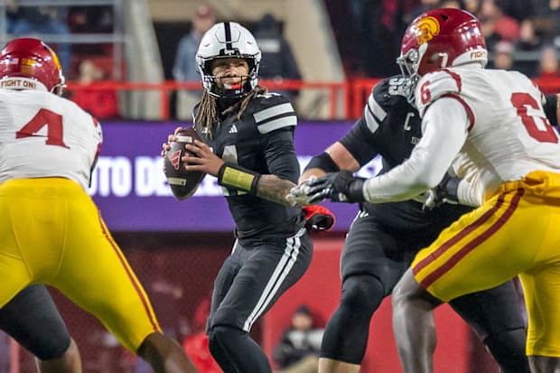 Nebraska quarterback TJ Lateef drops back to pass against USC.