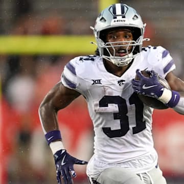 Former Kansas State running back DJ Giddens (31) runs the ball in a game against the Houston Cougars on Saturday, Nov. 2, 2024, in Houston, Texas, at TDECU Stadium. Mandatory Credit: Jack Gorman/Getty Images