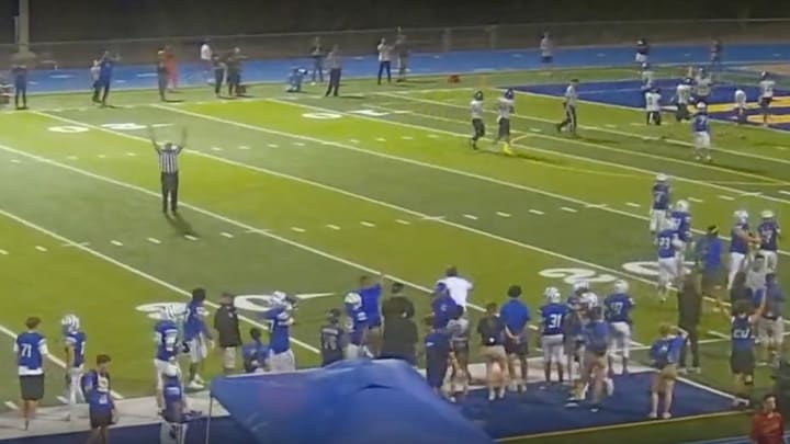 The head referee in Marana vs. Higley in Arizona agrees with his back judge, signaling TD. The side judge said incomplete.