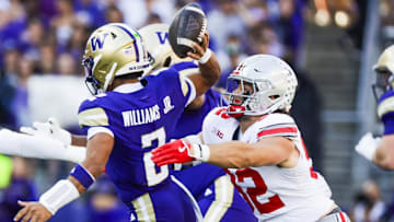 Sep 27, 2025; Seattle, Washington, USA; Ohio State Buckeyes defensive end Caden Curry (92) sacks Washington Huskies quarterback Demond Williams Jr. (2) during the second quarter at Husky Stadium. Mandatory Credit: Joe Nicholson-Imagn Images