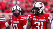 Texas Tech's Skyler Gill-Howard (0), David Bailey (31) and Jacob Rodriguez prepare to play defense against Arkansas-Pine Bluff during a non-conference football game, Saturday, August 30, 2025, at Jones AT&T Stadium.