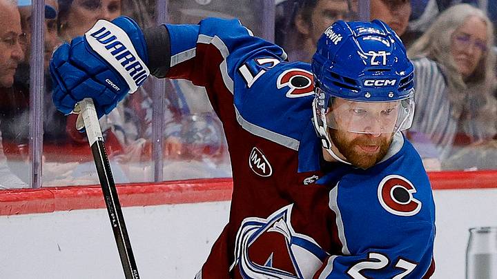 May 13, 2026; Denver, Colorado, USA; Colorado Avalanche defenseman Brett Kulak (27) controls the puck in the first period against the Minnesota Wild in game five of the second round of the 2026 Stanely Cup Playoffs at Ball Arena. Mandatory Credit: Isaiah J. Downing-Imagn Images