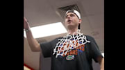 Todd Golden talks to the Florida Gators after their win in the national championship.