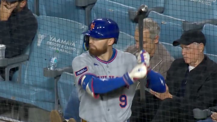 Brandon Nimmo warms up with a sledgehammer. Brandon Nimmo warms up with a sledgehammer.