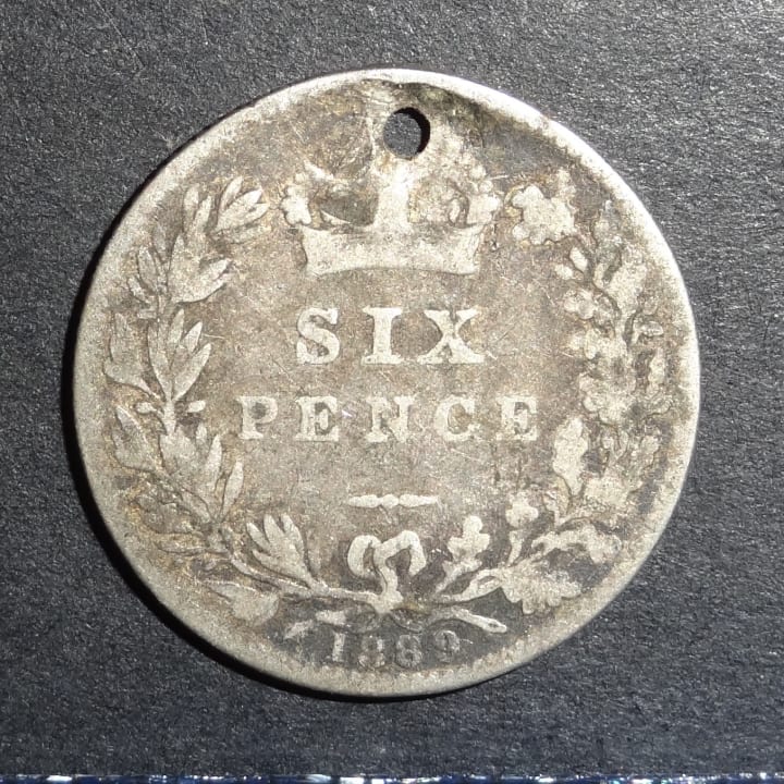 a british sixpence minted in 1889
