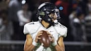 Westerville Central quarterback Jaystin Gwinn (7) looks to pass against Upper Arlington in a Division I regional quarterfinal Nov. 4.

Ohsaa Football 2022 Westerville Central Upper Arlington Nov 3