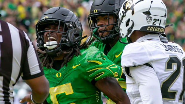 Oregon running back Noah Whittington celebrates a touchdown as the Oregon Ducks host Colorado 