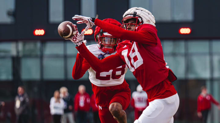 Nebraska wide receiver Isaiah Neyor catches a pass during a 2024 spring football practice. The transfer from Texas could figure in Nebraska's short passing game this fall.