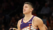 Nov 10, 2025; Phoenix, Arizona, USA; Phoenix Suns guard Grayson Allen (8) shoots a three pointer against the New Orleans Pelicans in the second half at the Mortgage Matchup Center. Mandatory Credit: Mark J. Rebilas-Imagn Images