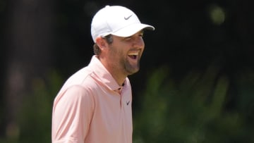 Scottie Scheffler shares a laugh on the during a practice round for the 2024 U.S. Open.