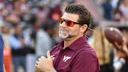 Sep 13, 2025; Blacksburg, Va.; Virginia Tech head coach Brent Pry and Old Dominion head coach Ricky Rahne talk before the game.