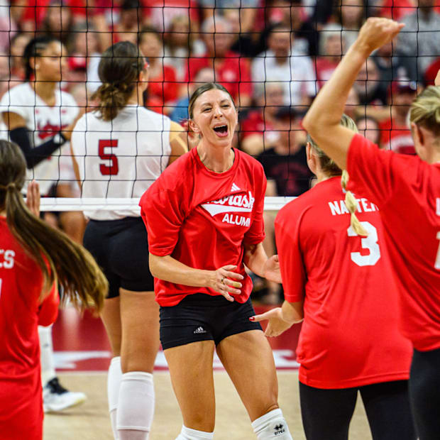 Gina Mancuso-Prososki celebrates a kill for the alums. 