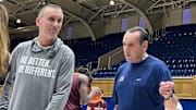 Arizona State coach Bobby Hurley, left, reunited with his former coach Mike Krzyzewski over the weekend at the Brotherhood Run charity exhibition in Durham, North Carolina.