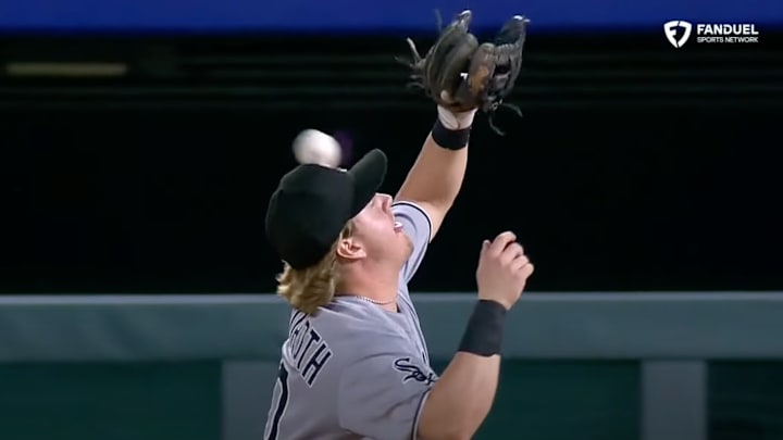 Chase Meidroth gets hit in the head by a fly ball. Chase Meidroth gets hit in the head by a fly ball.