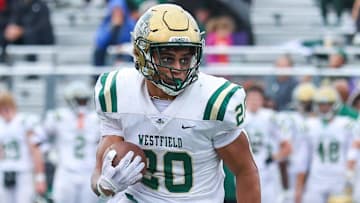 Westfield's Deacon King (20) rushes for 160 yards versus Homestead on Friday.