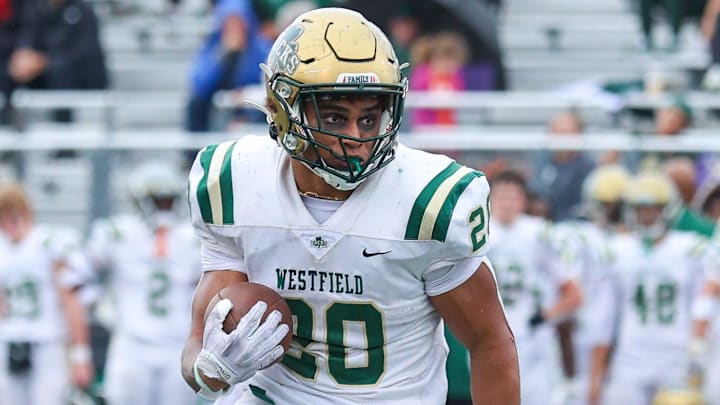 Westfield's Deacon King (20) rushes for 160 yards versus Homestead on Friday. Westfield's Deacon King (20) rushes for 160 yards versus Homestead on Friday.