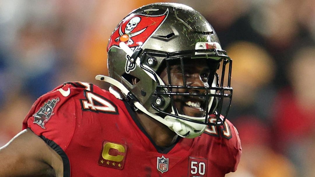 Jan 3, 2026; Tampa, Florida, USA; Tampa Bay Buccaneers linebacker Lavonte David (54) recovers a fumble by the Carolina Panthers in the second half at Raymond James Stadium. Mandatory Credit: Nathan Ray Seebeck-Imagn Images