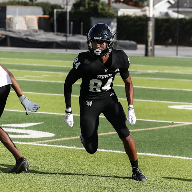 Servite wide receiver Jaelen Hunter runs downfield during a high school football game.