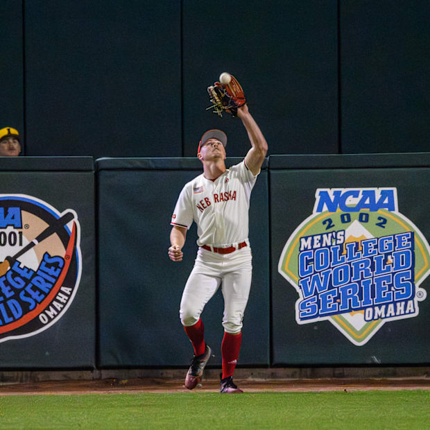 Garrett Anglim catches the final out of the game to secure Nebraska’s 7-4 comeback victory. 