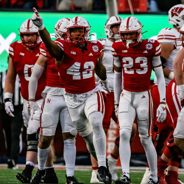 Mikai Gbayor (42) celebrates a stop on fourth and one. 