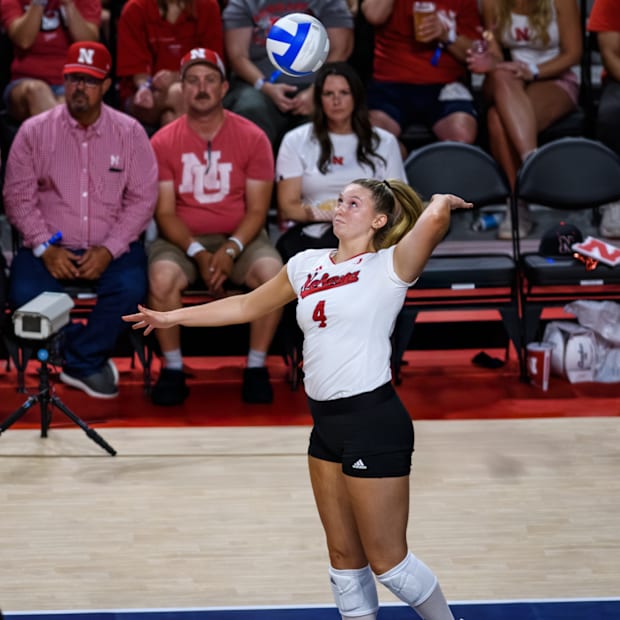 Campbell Flynn delivers a serve at the end of the second set. 