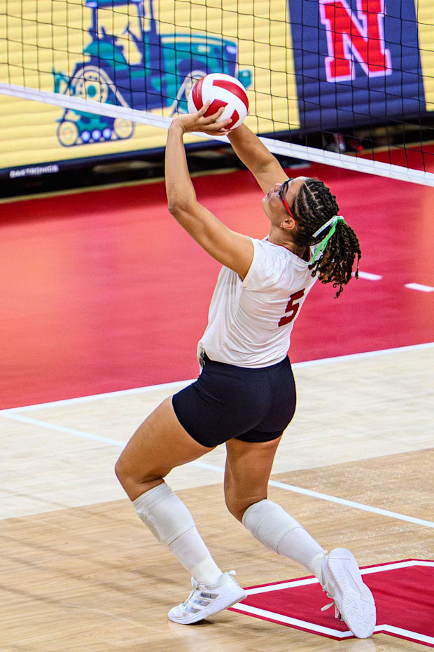 Rebekah Allick sets the ball. 