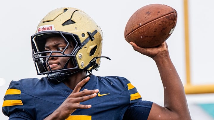 Fort Lauderdale St. Thomas Aquinas quarterback Mason Mallory completed 18 of 23 passes for three touchdowns and ran 10 times for 67 yards and a score to lead the Raiders past Hollywood McArthur, 34-7, in the Class 5A, Region 4 final on Nov. 28, 2025.