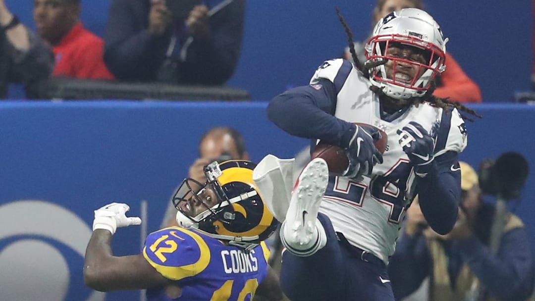 Feb 3, 2019; Atlanta, GA, USA; New England Patriots cornerback Stephon Gilmore (24) intercepts a Feb 3, 2019; Atlanta, GA, USA; New England Patriots cornerback Stephon Gilmore (24) intercepts a