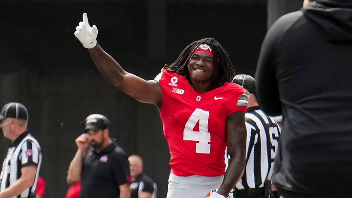 Ohio State Buckeyes wide receiver Jeremiah Smith (4) is recognized as the school's all time receiving leader during the NCAA football game against the Kent State Golden Flashes at Ohio Stadium in Columbus on Sept. 19, 2026.