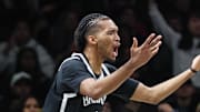 Oct 24, 2025; Brooklyn, New York, USA;  Brooklyn Nets forward Ziaire Williams (1) reacts after a no-call by the officials in the fourth quarter against the Cleveland Cavaliers at Barclays Center. Mandatory Credit: Wendell Cruz-Imagn Images