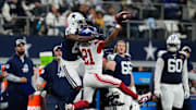 Nov 28, 2024; Arlington, Texas, USA; New York Giants cornerback Adoree' Jackson (21) breaks up a pass intended for Dallas Cowboys wide receiver Jonathan Mingo (81) during the first half at AT&T Stadium. 