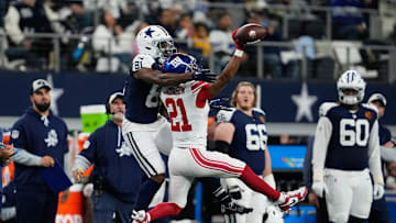 Nov 28, 2024; Arlington, Texas, USA; New York Giants cornerback Adoree' Jackson (21) breaks up a pass intended for Dallas Cowboys wide receiver Jonathan Mingo (81) during the first half at AT&T Stadium. 