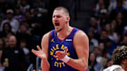 Nov 28, 2025; Denver, Colorado, USA; Denver Nuggets center Nikola Jokic (15) reacts after a play in the fourth quarter against the San Antonio Spurs at Ball Arena.