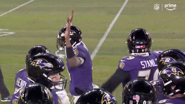 Lamar Jackson asks Baltimore Ravens fans to quiet down while in the huddle. Lamar Jackson asks Baltimore Ravens fans to quiet down while in the huddle.