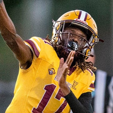 Glades Central quarterback Taj Barnes throws the ball against Pahokee during the Muck Bowl on November 1, 2024, in Belle Glade, Florida.