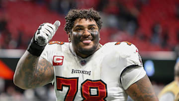 Tampa Bay Buccaneers offensive tackle Tristan Wirfs (78) celebrates after a victory against the Atlanta Falcons 