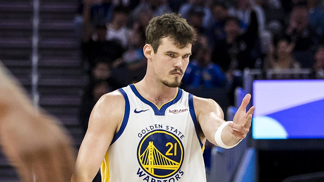 Oct 8, 2025; San Francisco, California, USA;  Golden State Warriors center Quinten Post (21) reacts after hitting a three-point shot against the Portland Trail Blazers during the fourth quarter at Chase Center. Mandatory Credit: John Hefti-Imagn Images
