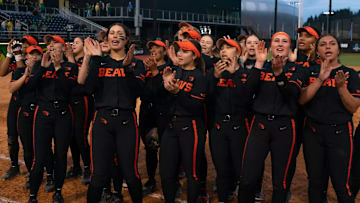 Oregon State hired former Oregon pitcher Morgan Scott as the new pitching coach.