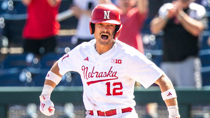 Nebraska's Cole Evans celebrates after batting in a runner during a semifinal game of the Big Ten Baseball Tournament against Maryland, Saturday, May 27, 2023, at Charles Schwab Field in Omaha, Neb.