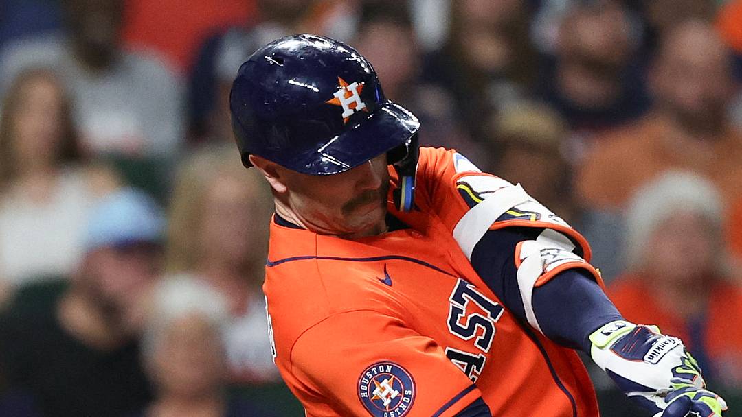 Aug 21, 2026; Houston, Texas, USA;  Houston Astros first baseman Christian Walker (8) hits a RBI sacrifice against the Athletics in the fourth inning at Daikin Park.  Mandatory Credit: Thomas Shea-Imagn Images