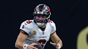 Tampa Bay Buccaneers quarterback Baker Mayfield (6) scrambles out the pocket against the New Orleans Saints