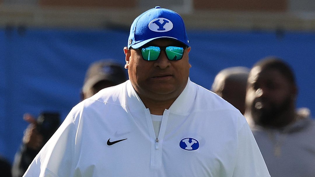 Dec 27, 2025; Orlando, FL, USA;  BYU Cougars head coach Kalani Sitake works out prior to the game at Camping World Stadium. Mandatory Credit: Kim Klement Neitzel-Imagn Images