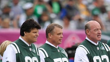 Oct 13, 2013; East Rutherford, NJ, USA; New York Jets former players Mark Gastineau (99) and Joe Klecko (73) and Marty Lyons serve as honorary captains during the coin toss before the New York Jets faced the Pittsburgh Steelers at MetLife Stadium. The Steelers won the game 19-6. Mandatory Credit: Joe Camporeale-Imagn Images