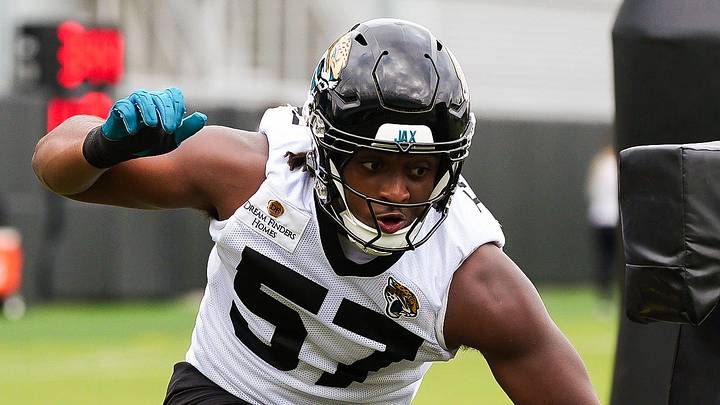 Jaguars defensive end Bryan Thomas Jr. (57) runs a drill with center Robert Hainsey (73) during the Jaguars’ fourth OTA of the year, Monday June 1, 2026 at the Miller Electric Center in Jacksonville, Fla. [Doug Engle/Florida Times-Union]