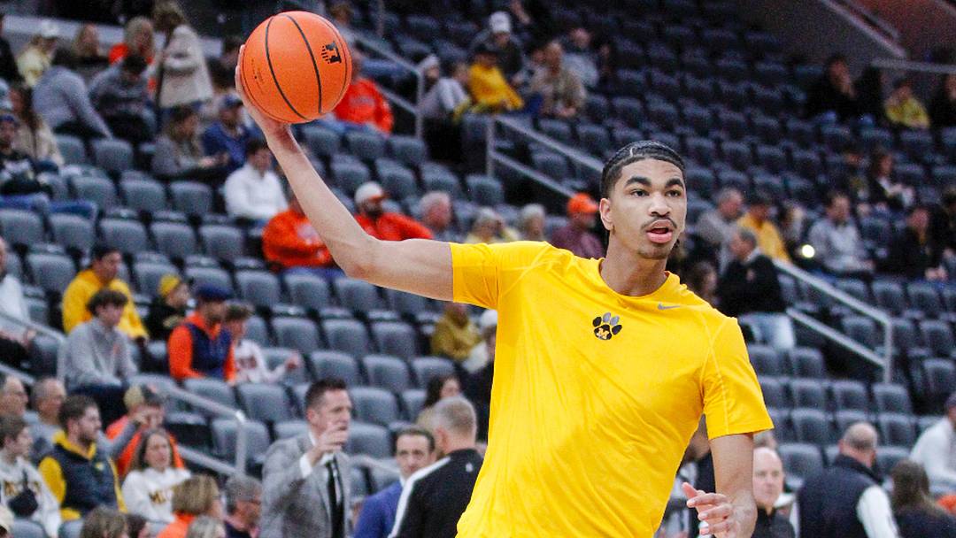 Trent Burns passes the ball during warmups ahead of the Braggin Rights game vs Illinois Trent Burns passes the ball during warmups ahead of the Braggin Rights game vs Illinois