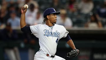 Hooks pitcher Miguel Ullola throws a pitch on Opening Night at Whataburger Field on Friday, April 5, 2024, in Corpus Christi, Texas.